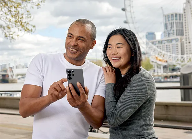 A couple with a phone
